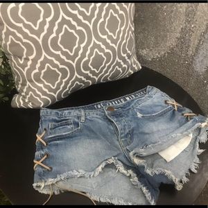 Frayed denim lace up shorts
